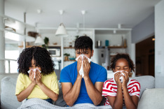 3 African American kids/teens sneezing with Klenix  